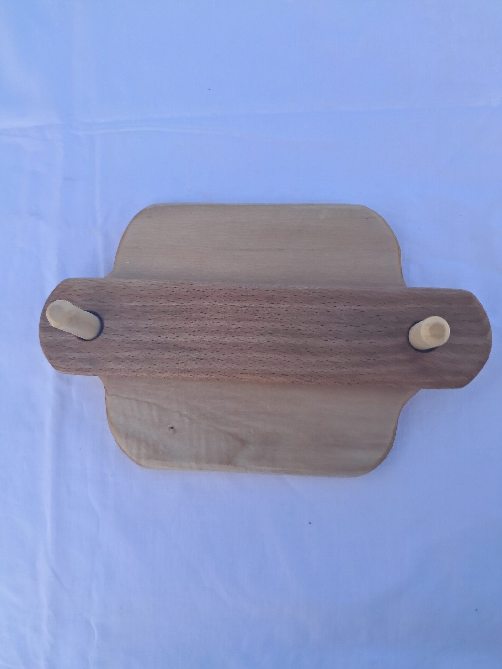 Χειροποίητη ξύλινη χαρτοπετσετοθήκη με φυσική υφή ξύλου.